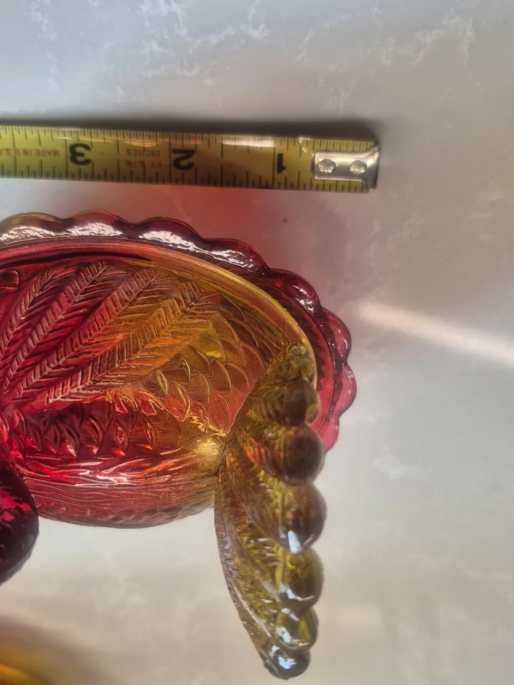 Hen On Basket. Carnival Glass Decorative Dish in Amber to Ruby Iridescent